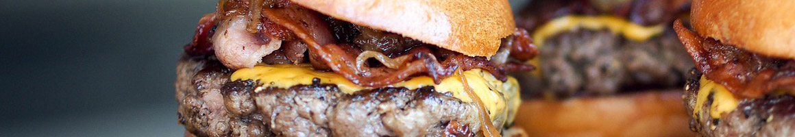 Eating Burger at Sandi's Drive Inn restaurant in Richfield, UT.